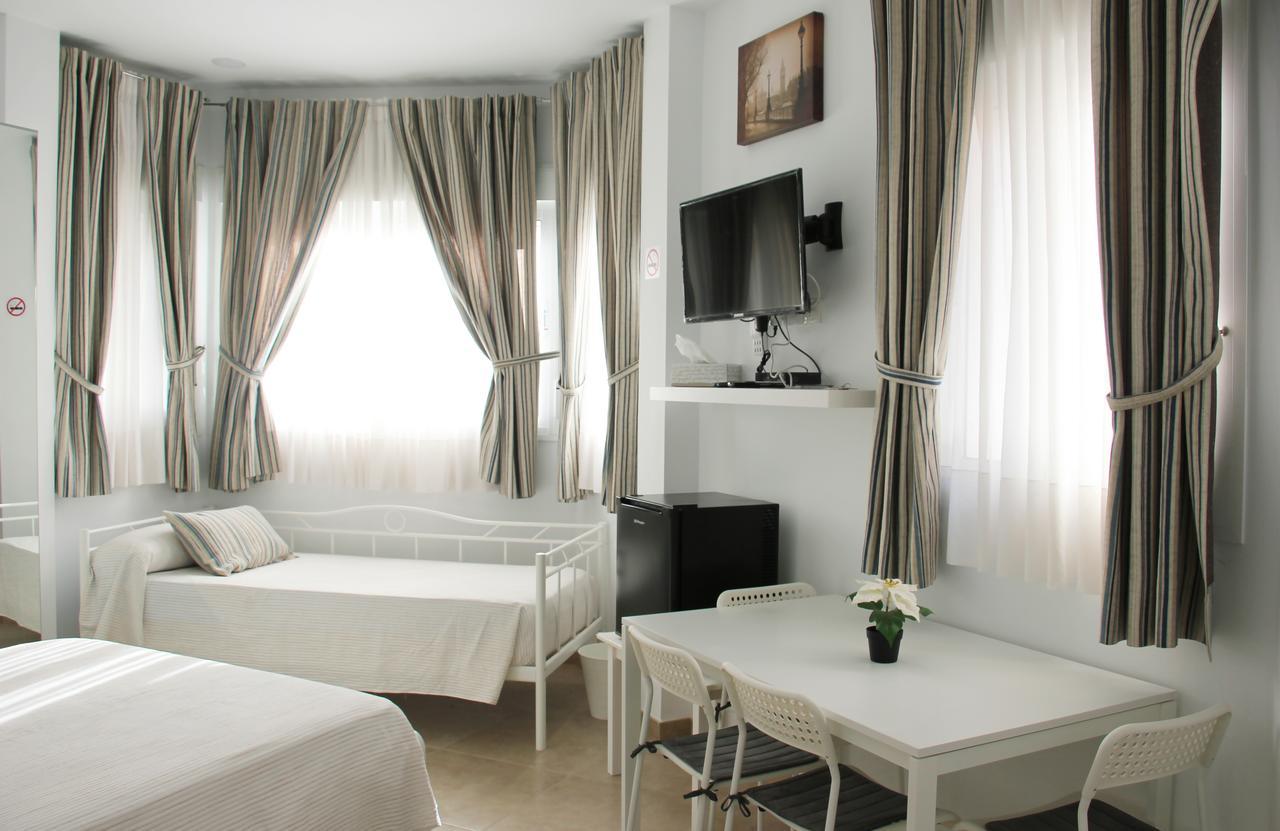 Hotel Sunnylivings à Séville Extérieur photo